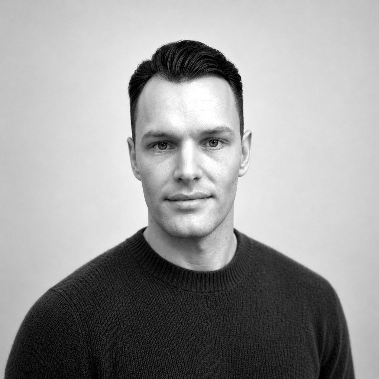 Kai Hatchman headshot in black and white